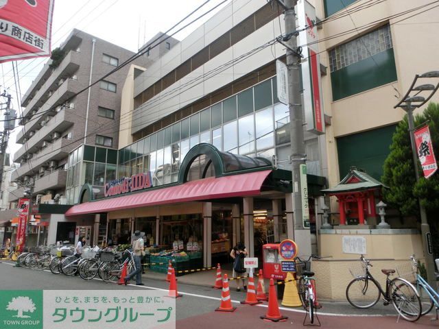 スーパー　コモディイイダ中村橋店（スーパー）まで490m