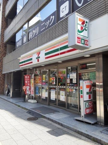 コンビニ　セブンイレブン（コンビニ）まで1076m