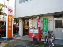 郵便局　世田谷弦巻郵便局（郵便局）まで448m