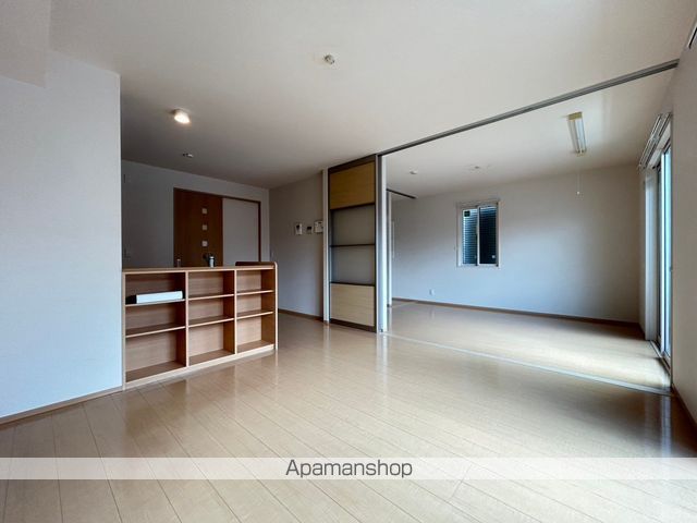 Porte Bonheur姫城 A棟の居間写真