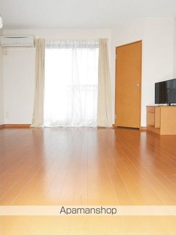 レオパレスソレイユIIの居間写真