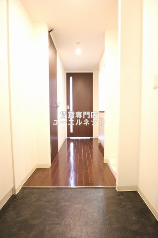 地下鉄御堂筋線 江坂駅 徒歩3分 15階建 築19年の玄関写真