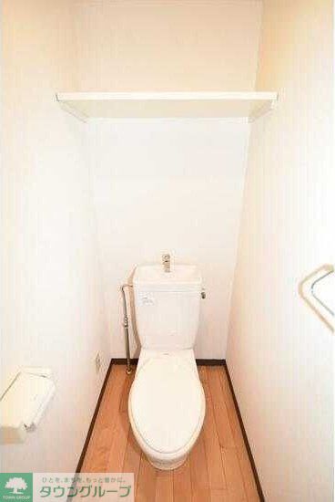 多摩都市モノレール 中央大学・明星大学駅 徒歩3分 4階建 築26年のトイレ写真