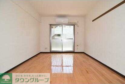 多摩都市モノレール 中央大学・明星大学駅 徒歩3分 4階建 築26年の居間写真