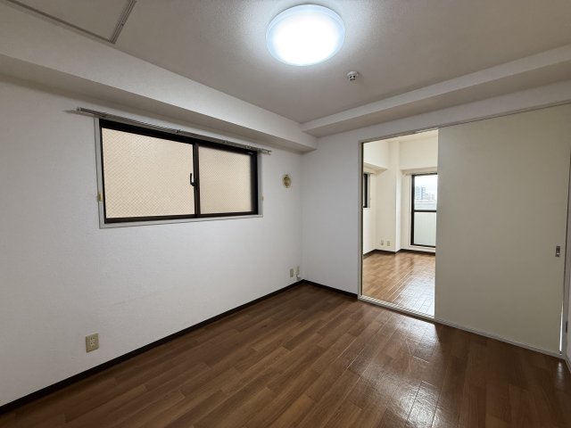 シティパレスアライの居間写真