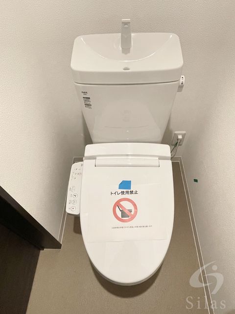 阪急神戸線 神崎川駅 徒歩3分 5階建 築7年のトイレ写真