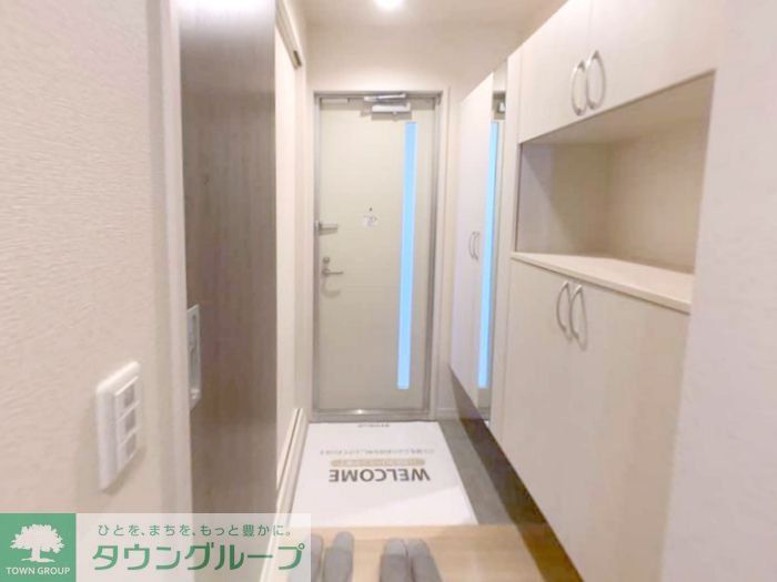 ルピナスおおたかの森 住居の玄関写真