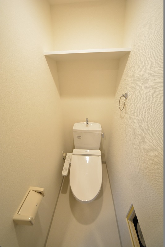トイレ　プレサンス谷町リーベ　温水暖房便座