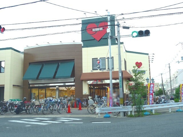 スーパー　スーパーマルヤス登美の里店（スーパー）まで391m