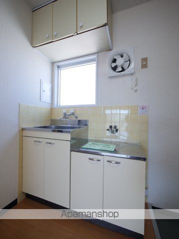 岡山市中区 4階建 築38年のキッチン写真