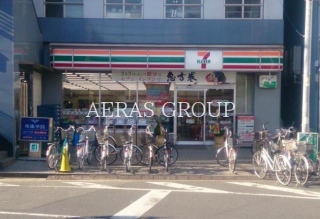 コンビニ　セブンイレブン越谷千間台駅西口店（コンビニ）まで180m