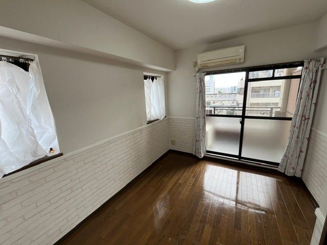 地下鉄御堂筋線 東三国駅 徒歩3分 10階建 築29年の居間写真