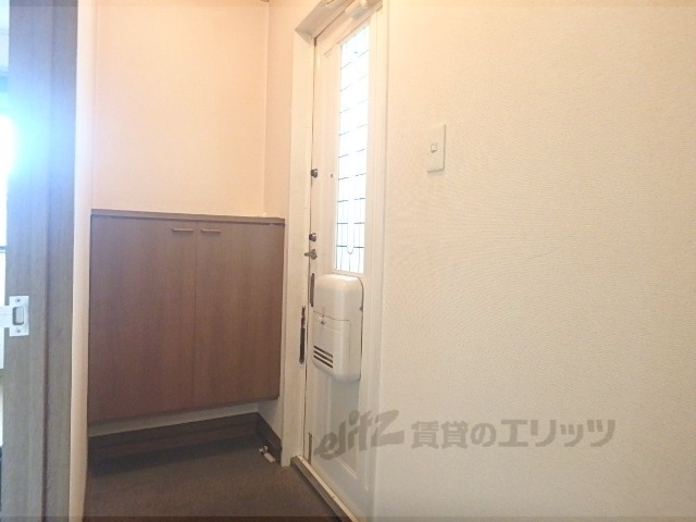 ヴィラ塚の木1号館の玄関写真