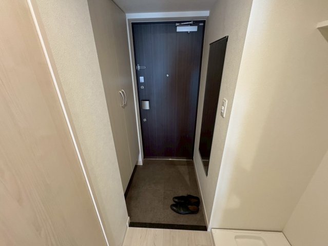 プレサンスNEO上新庄PRIMECRUISの玄関写真