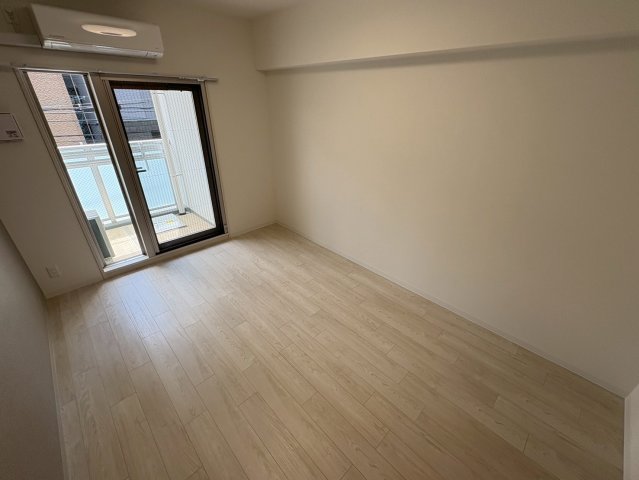 プレサンスNEO上新庄PRIMECRUISの居間写真