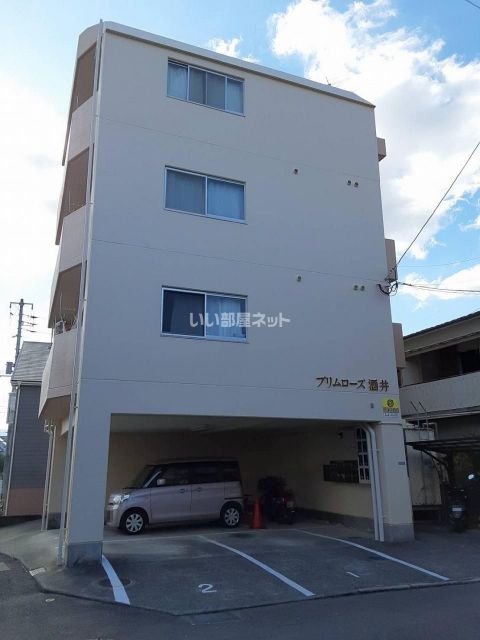 松山市雄郡のマンションの建物外観