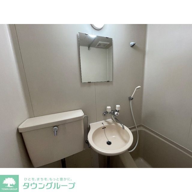 洗面設備　※同建物別号室別タイプ参考写真です