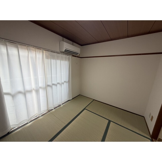 ジュネス石切の居間写真