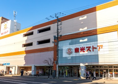 スーパー　東光ストア麻生店（スーパー）まで739m