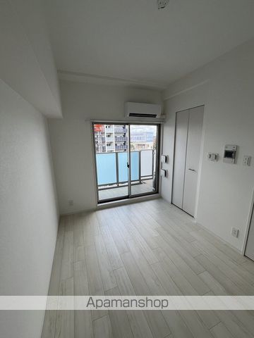 地下鉄御堂筋線 中津駅 徒歩6分 15階建 築3年の居間写真