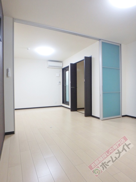 フジパレス山之内II番館の居間写真