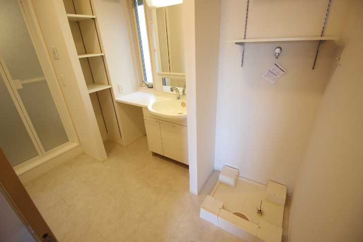 洗面設備　３０２号室の写真