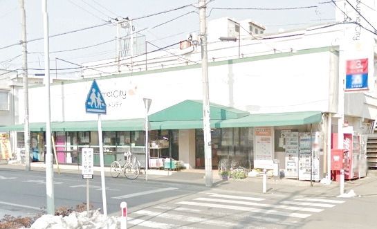 スーパー　グルメシティ鵜野森店（スーパー）まで878m