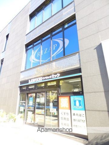 コンビニ　ローソン・ドラッグミック江坂広芝町店（コンビニ）まで375m