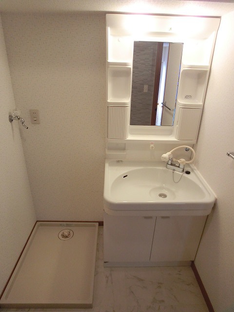 洗面設備　別部屋の写真です。現況優先となります。