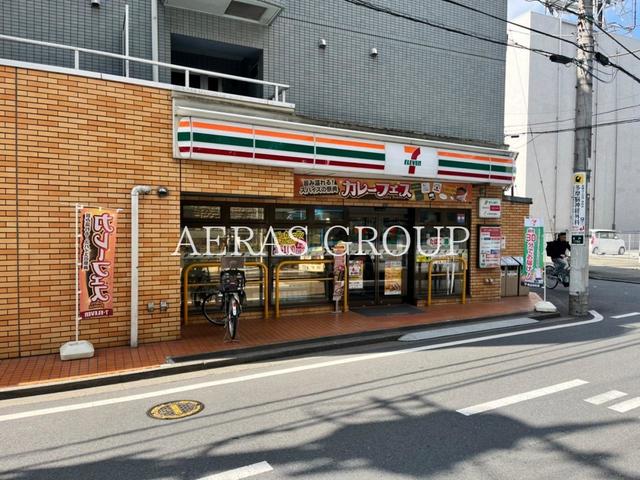 コンビニ　セブン-イレブン 川崎多摩区役所前店（コンビニ）まで406m