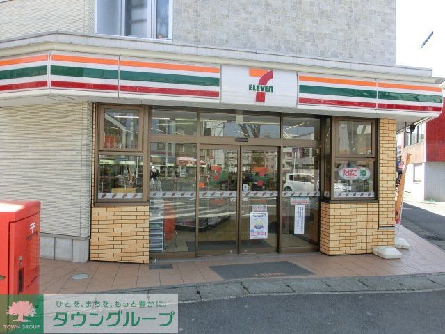 コンビニ　セブンイレブン松戸上本郷駅前店（コンビニ）まで323m