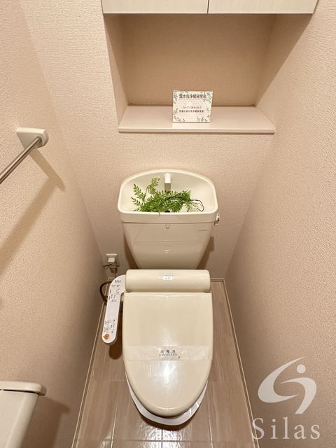 阪急箕面線 箕面駅 徒歩9分 3階建 築14年のトイレ写真