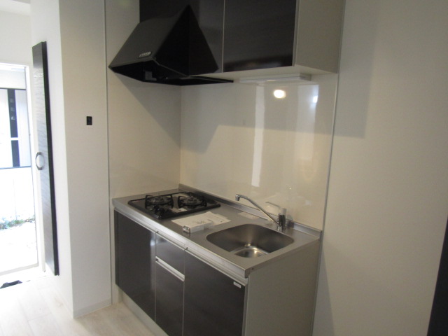 キッチン　※同物件の別部屋の写真です。