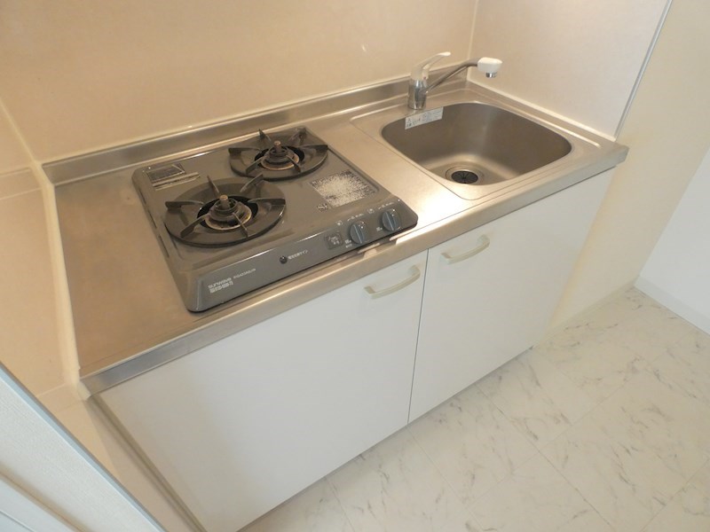 キッチン　※以下他号室参考写真となります。