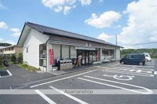 コンビニ　セブン－イレブン明日香御園店（コンビニ）まで73m