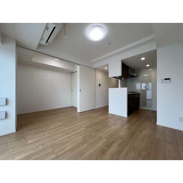 居室・リビング　※写真は１３０２号室