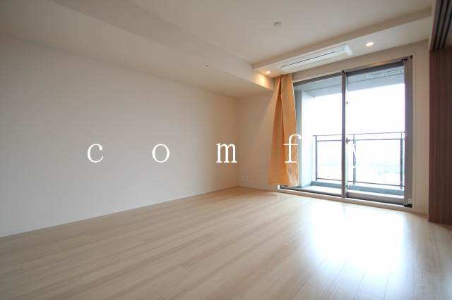 居室・リビング　※同建物別室の写真です。