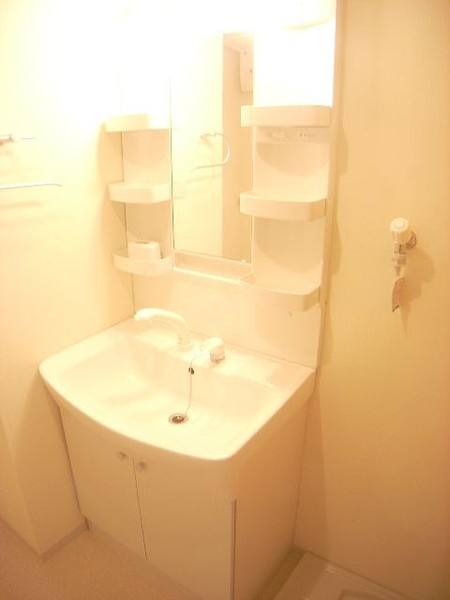 洗面設備　※別号室の写真です