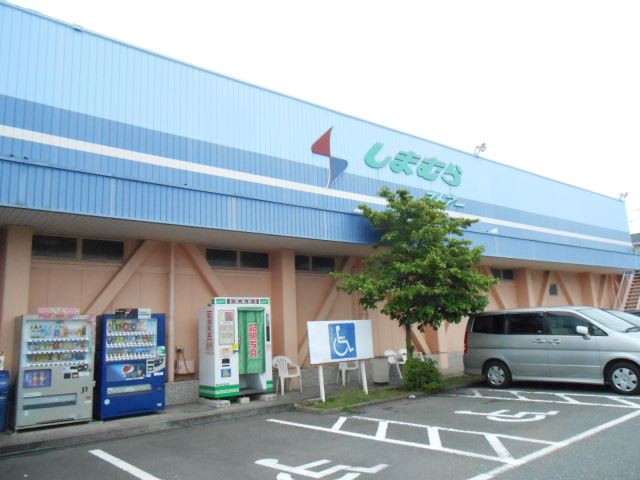 スーパー　しまむらストアー（スーパー）まで560m