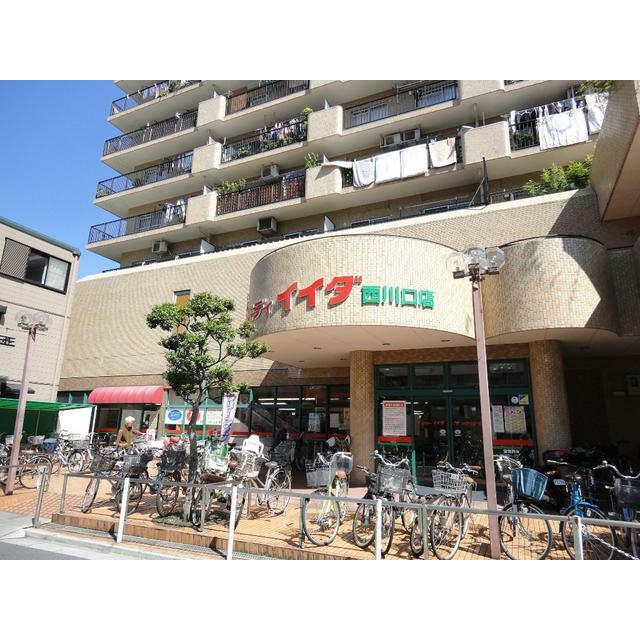 ショッピングセンター　コモディイイダ西川口店（ショッピングセンター）まで450m