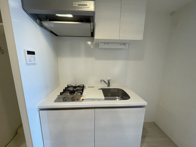 キッチン　同マンション反転タイプの部屋写真