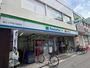 コンビニ　ファミリーマート薬ヒグチ弥刀駅前店（コンビニ）まで171m