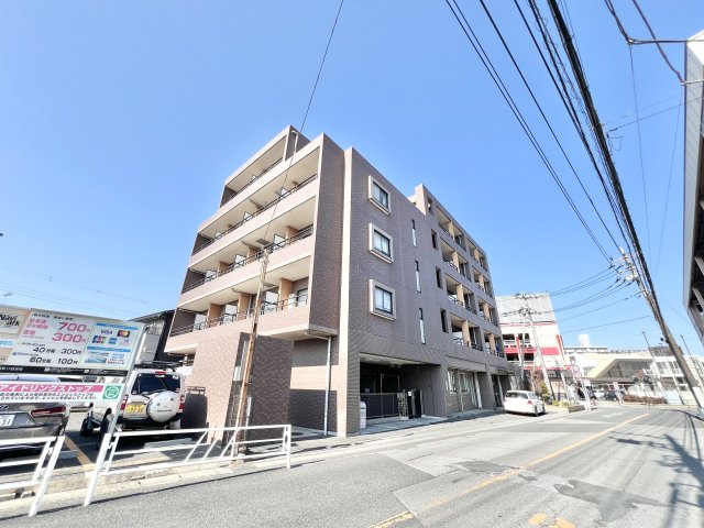 四街道市四街道のマンションの建物外観