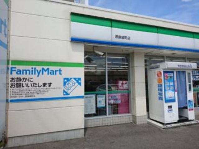 コンビニ　ファミリーマート堺錦綾町店（コンビニ）まで701m
