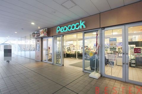 スーパー　ピーコックストア文京グリーンコート店（スーパー）まで712m