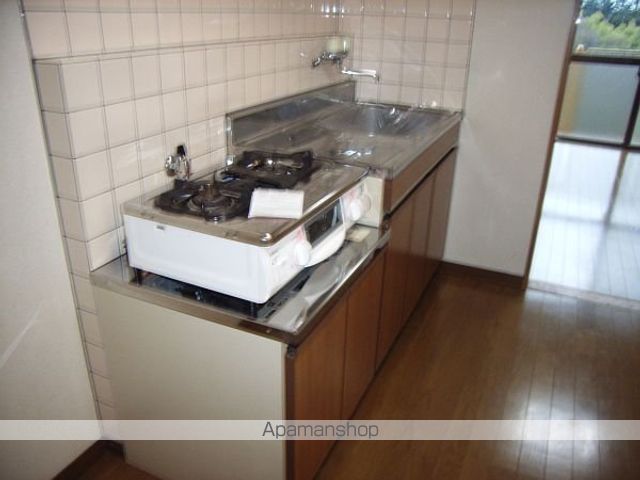 ニュー郷ケ丘のキッチン写真