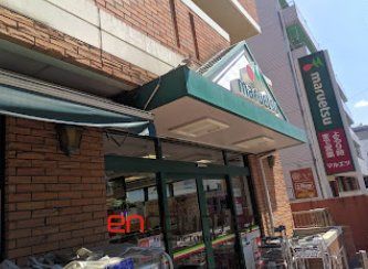 コンビニ　ファミリーマート玉川三丁目店（コンビニ）まで530m