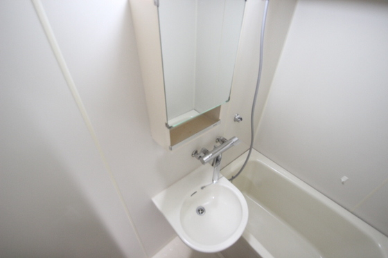 洗面設備　※別号室の写真です