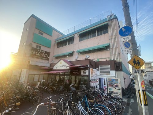 スーパー　ワッツウィズ千船グルメシティ店（スーパー）まで671m