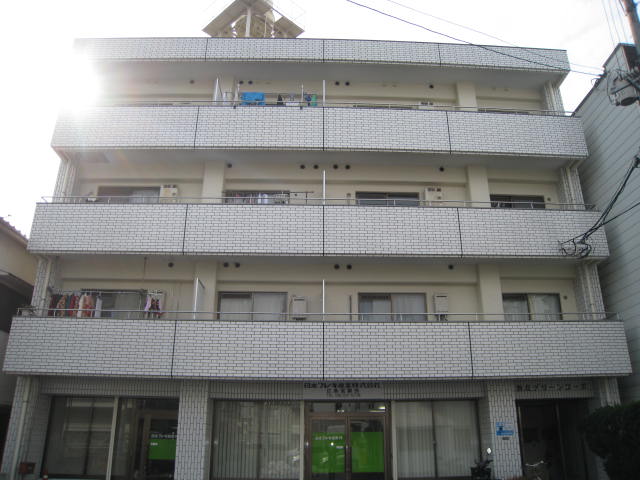 広島市西区新庄町のマンションの建物外観